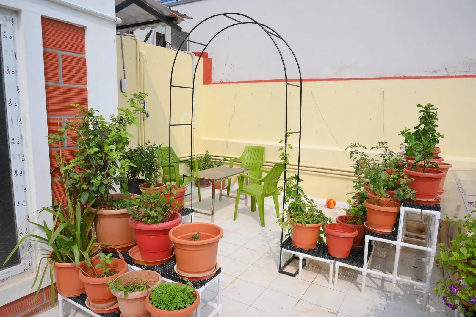 Private garden with colonial arch at The Urban Loft